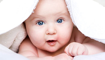 Baby under the blankets